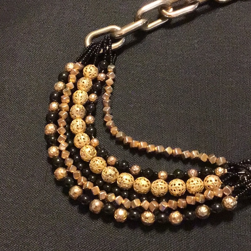 EUC,25” beaded necklace with 3”.  Extender.Black,gold beads,silver chain chunky